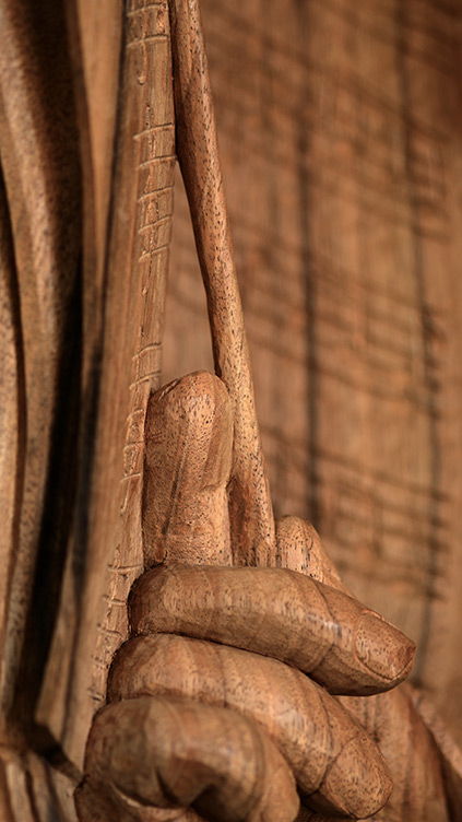 Sculpture sur bois, main de chef d'orchestre