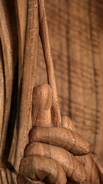 Sculpture sur bois, main de chef d'orchestre